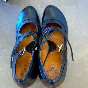 Almost new fluevogs with chewed heels